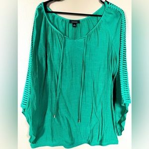 B-Design blouse with cute see through patterned sleeves. Women’s size Large
